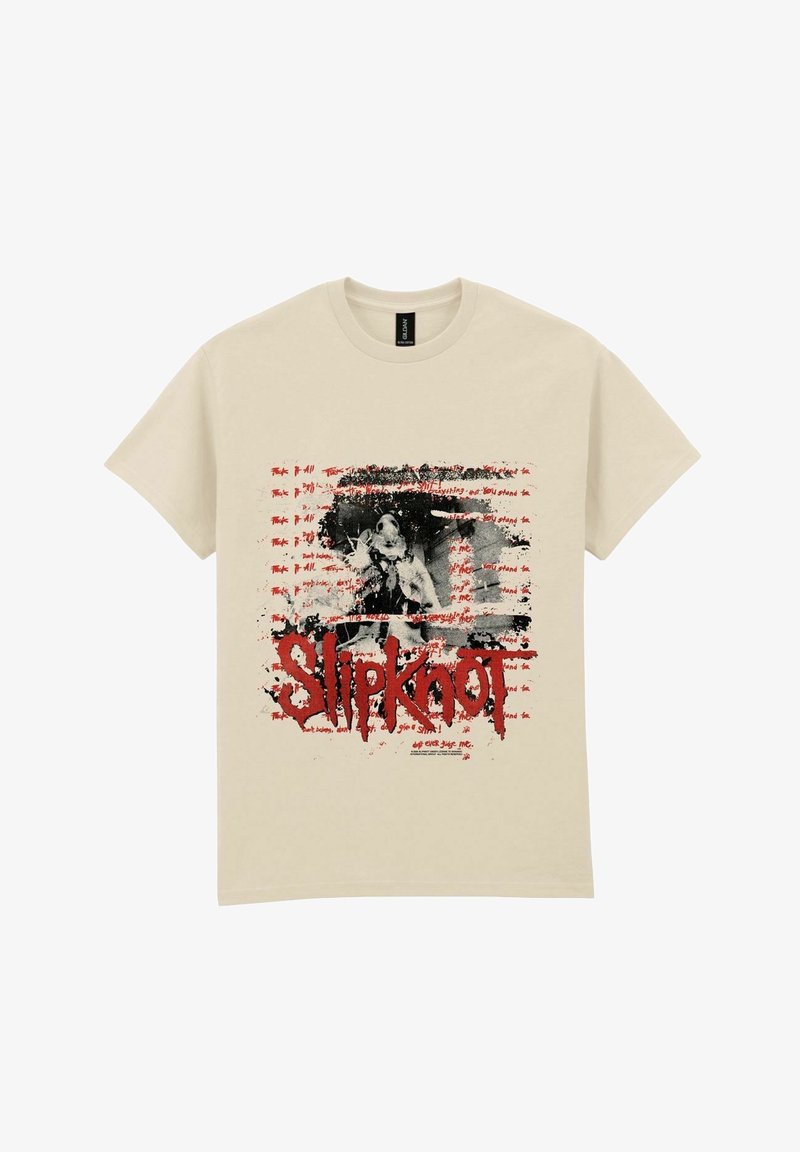 Beżowa bawełniana koszulka z krótkim rękawem, z graficznym wzorem zawierającym czarno-białe zdjęcie, czerwony tekst i efekty rozprysków; wyraźnie widoczny napis "Slipknot".