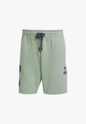 Világos zöld pamut rövidnadrág elasztikus derékkal, sötétkék zsinórral és fekete Star Wars grafikával a bal lábon. Az Adidas logóját is tartalmazza.