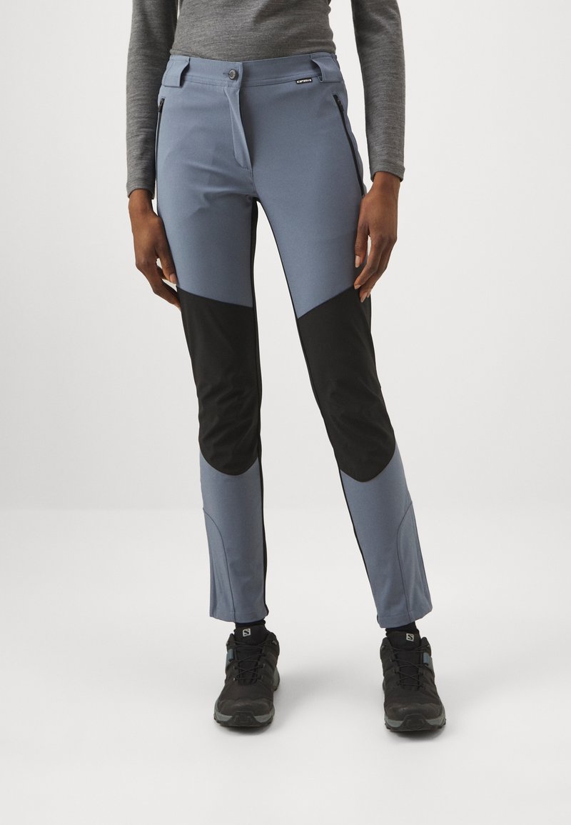 Sininen ja musta ulkoiluhousuissa on slim fit -leikkaus, pehmeä joustava kangas, vetoketjulliset sivutaskut ja vahvistetut polvipaikat kestävyys varten.