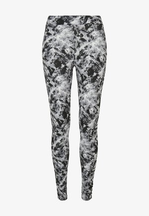 Schwarz-weiße gefütterte Leggings aus einem glatten, dehnbaren Stoff, mit einem abstrakten Design und einer taillierten Passform.