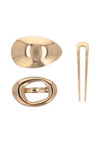 Tre accessori per capelli: una clip ovale color oro, una chiusura a cerchio attorcigliata e un sottile fermaglio per capelli. Tutti presentano una finitura metallica lucida.