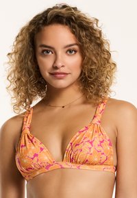 Trīsstūra bikini tops spilgti oranžā un rozā ziedu rakstā, ar savilktām siksnām un sakrautu dizainu papildu tekstūras iegūšanai.