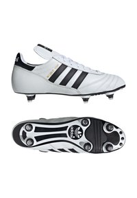 White soccer cleats with a leather upper, black stripes, and gold "WORLD CUP" text. Features a black outsole with molded studs and Adidas logo.