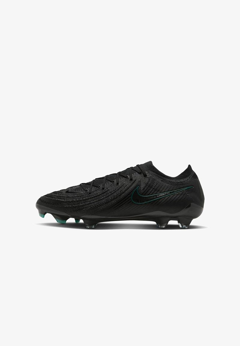 Scarpa da calcio nera con tomaia texturizzata e baffo Nike verde. Progettata per le prestazioni con un design affusolato e tacchetti sagomati.