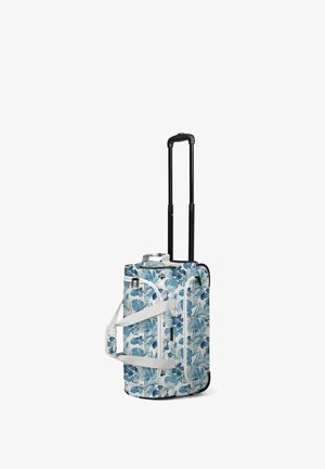 Sac de voyage à roulettes souple, motif floral bleu et blanc, avec poignées blanches et poignée télescopique noire déployée.