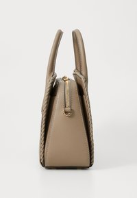 Beige synthetic handbag with braided detailing, flat base, gold-tone zipper, and two structured handles, shown from the side.