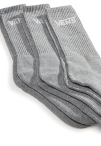 Calcetines grises de mezcla de algodón con textura acanalada, con una banda de logo blanca en la parte superior, apilados en fila.