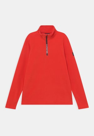 Lyse rød langærmet pullover med en kvart lynlås og opretstående krave, med en sort lynlåstrækker mærket "BRUNOTTI."
