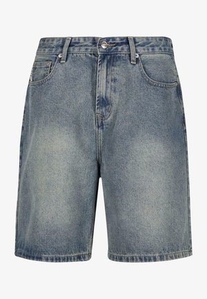 Heledad denimsid, heledat sinise pesuga, mis on lõdvalt kroonutud, viie-taskulise kujunduse ning tõmbluku ja nupuga sulgemisega.