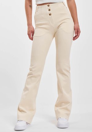 Freddy WRUP PUSH UP HIGH WAIST FLARED - Tygbyxor - beige