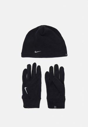Schwarzes Wintermütze- und Handschuhset aus Fleece, jeweils mit silbernem Nike-Logo; weicher Stoff; figurbetontes Design; warm und leicht.
