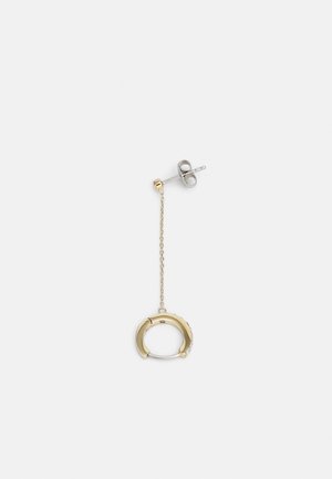 Gold and silver dangle earring with a small hoop attached to a thin chain and a silver post stud backing on a white background.