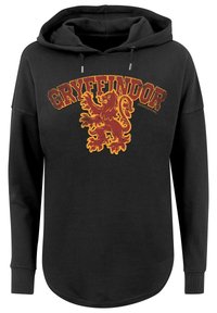 Čierna mikina s kapucňou so zlatým a vínovým logom Gryffindoru, s rebrovanými manžetami a okrúhlym lemom. Nastaviteľná šnúrka na kapucni.