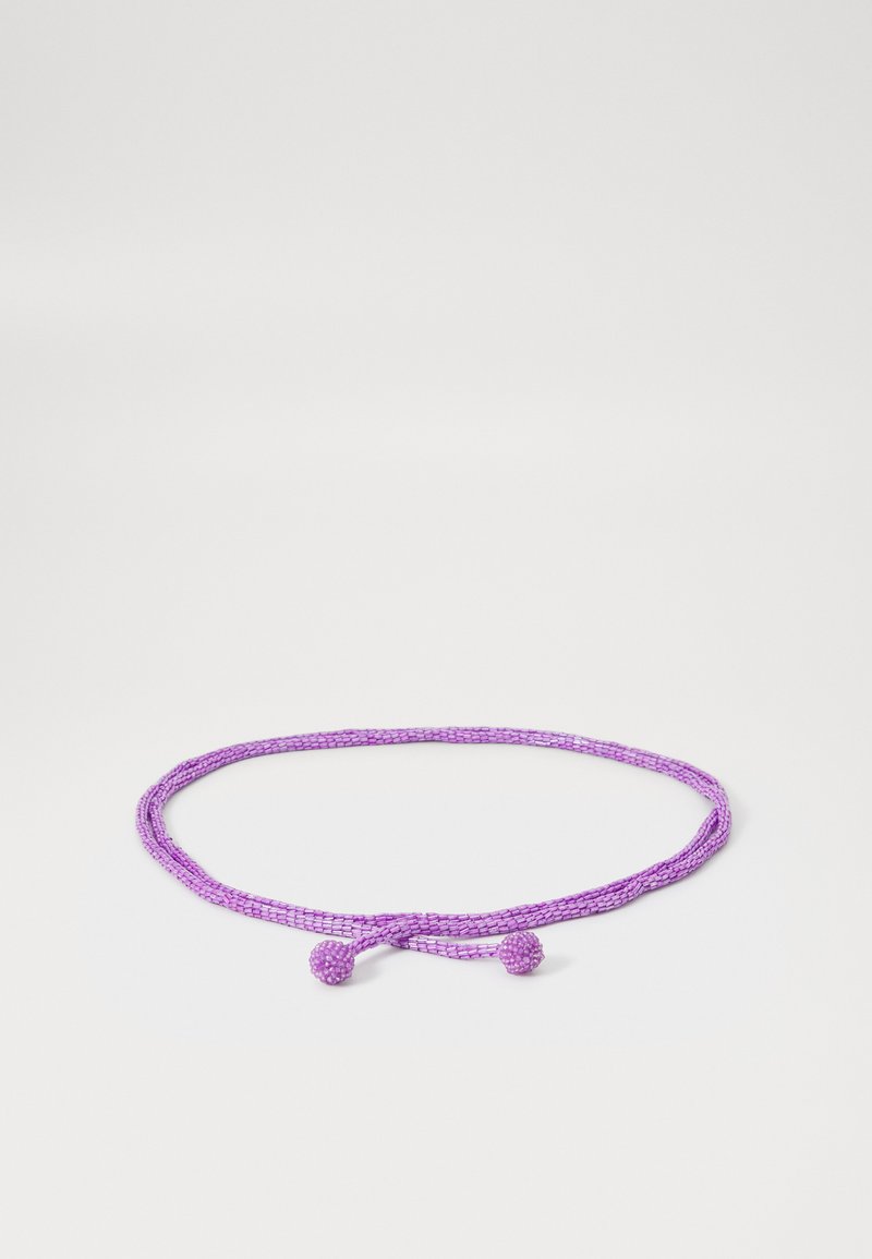Purple woven cord with two spherical ends, featuring a textured surface. The design is simple and circular in shape.
