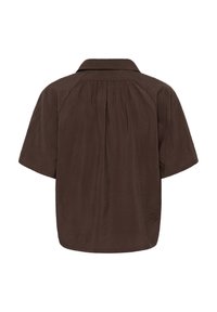 Chemise marron à manches courtes avec une coupe ample et un détail en tissu froncé sur le haut du dos, vue de dos.