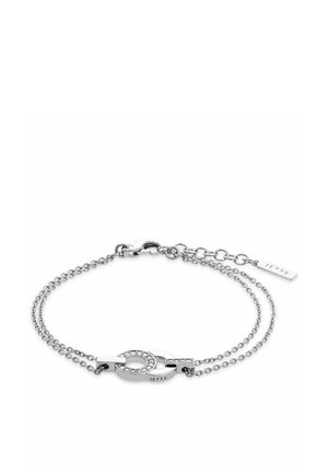 Zilveren armband met twee in elkaar grijpende schakels, waarvan één versierd is met heldere stenen, op een dubbele ketting. Inclusief een slotje en een rechthoekig label met de opdruk "Jette."
