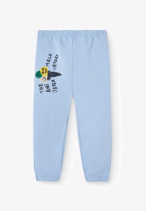 Lyseblå sweatpants lavet af blødt bomuld, med et grafik af isvafler og teksten "THE ANIMALS OBSERVATORY" i sort og farvede accenter.