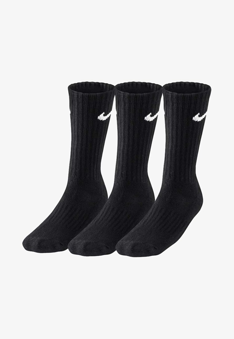 Calcetines de algodón negros de tipo crew con textura acanalada y un logo de swoosh blanco de Nike. Se venden en un paquete de tres.