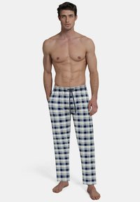 Men's plaid pajama pants in navy and white, featuring an elastic waistband with a drawstring, straight leg cut, and a soft fabric texture.
