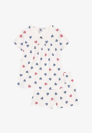 Ensemble de pyjama en coton blanc comprenant un haut à manches courtes et un short, décoré d'un motif de cœurs rayés rouges et bleus. Accentué de détails froncés.