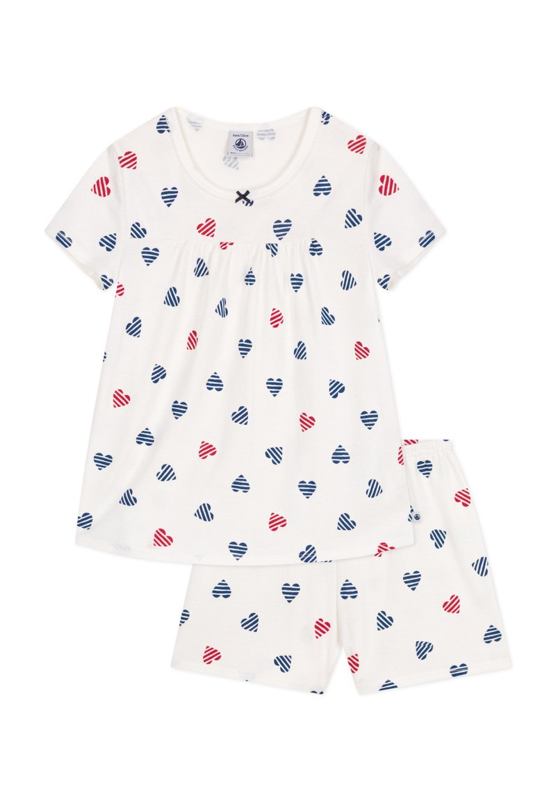 Ensemble de pyjama en coton blanc comprenant un haut à manches courtes et un short, décoré d'un motif de cœurs rayés rouges et bleus. Accentué de détails froncés.