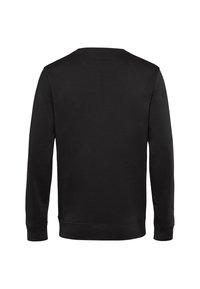 Felpa nera con maniche lunghe, collo rotondo, polsini e vita a coste. Tessuto dalla consistenza liscia, design minimalista, senza grafiche o fantasie.