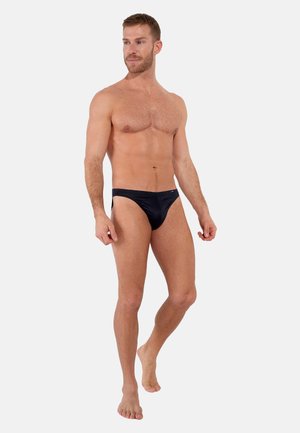 Schwarze Bikini-Slip aus glattem Stoff, mit einem tief sitzenden Design und minimaler Bedeckung. Schlichte, unverzierte Optik.