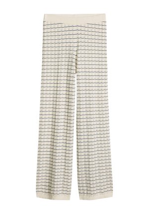 Pantalon large crème avec taille élastique et motif de lignes ondulées horizontales bleu marine sur toute la surface.
