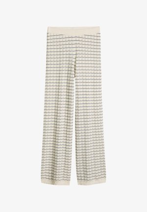 Pantalon large crème avec taille élastique et motif de lignes ondulées horizontales bleu marine sur toute la surface.