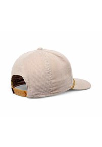 Beige corduroy cap with a curved brim, featuring a gold accent and adjustable tan strap at the back. Ribbed texture visible.