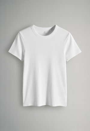 Biała krótka koszulka z krótkim rękawem wykonana z prążkowanej bawełny, z okrągłym dekoltem i luźnym krojem, o gładkiej fakturze i minimalistycznym wzornictwie.