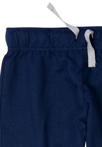 Dunkelblaue Jogginghose mit weichem, glattem Textil. Sie verfügt über einen elastischen Bund mit einer hellgrauen Kordel zur Anpassung der Passform.