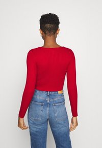 Monki Gilet - red