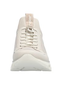 Light beige athletic sneakers with a mesh upper, flat laces, a padded collar, and a textured rubber sole, designed for comfort and support.
