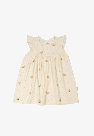 Vaalean kerma beige mekko lyhyillä lennokkailla hihoilla, jossa on koirakuosi ja keltaisia tähtiä. Pehmeä kangas, kerätty vyötärö ja takana nappikiinnitys.