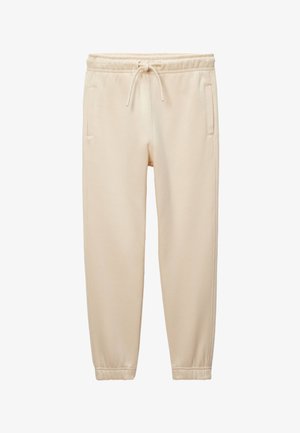 Pantalons de jogging couleur crème avec taille élastique et cordon de serrage, dotés de poches latérales et de poignets fuselés pour une coupe ajustée.
