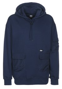 Sudadera azul marino fabricada en tejido suave, con un bolsillo frontal, dos bolsillos laterales, capucha con cordones y puños acanalados. Etiqueta Urban Classics visible.