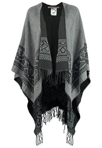 Poncho tissé gris et noir avec motifs géométriques et bords frangés, devant ouvert, et texture de tissu douce.