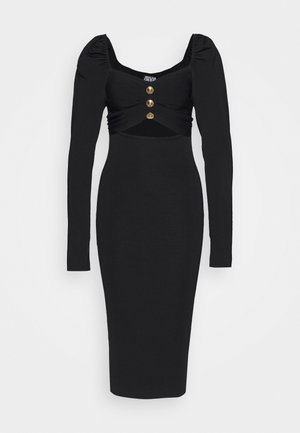 Robe noire à manches longues avec une silhouette ajustée, dotée d'un décolleté carré, de détails de manches froncées et de trois boutons dorés à la taille.
