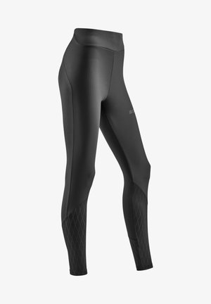 Schwarze Sportleggings mit glatter Textur, hohem Bund und Rautenmustern entlang der unteren Beine.