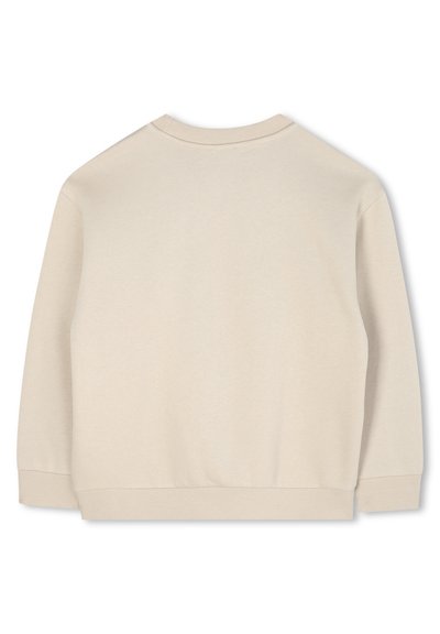 Sweatshirt couleur crème avec un col rond, des manches raglan longues et un ourlet côtelé. Texture douce, design minimaliste, sans motifs visibles.