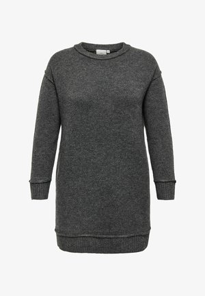 Grå stickad klänning med rundad halsringning, långa ärmar och ribbade muddar och nederkant. Mjuk textur med en något oversized passform.