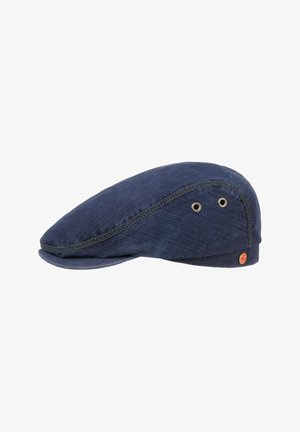 Navy blue flat cap with side ventilation holes and visible stitching, featuring a small round red logo near the brim.
