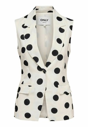 Blazer blanc sans manches, cintré, avec grands pois noirs, revers crantés, deux poches avant à rabat et fermeture par un bouton noir unique.