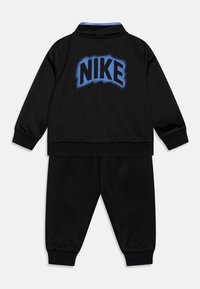 Nike Sportswear POWDER PLAY PROPUS SET - Spordijakk - black