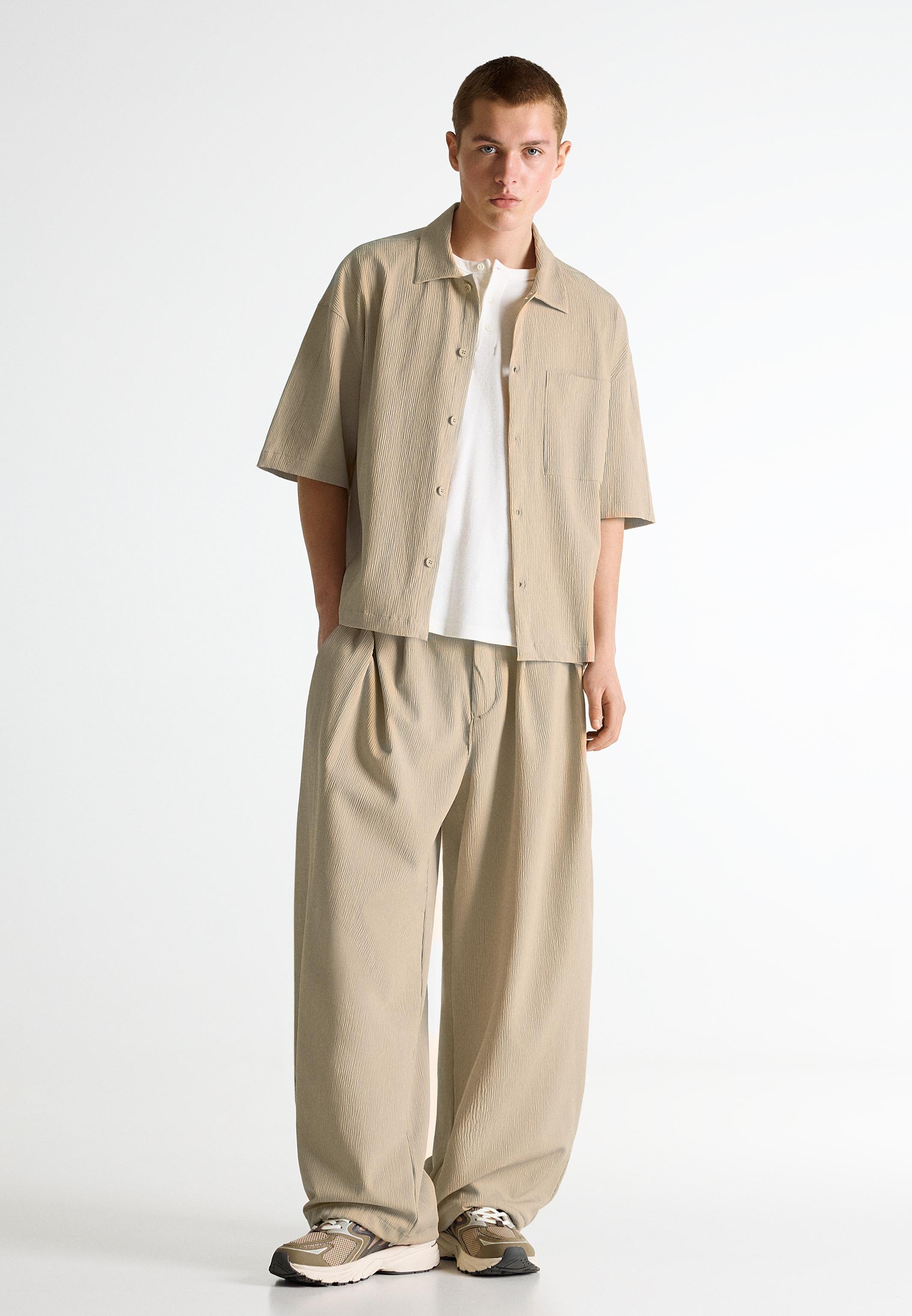 Bershka PLEATED SUPER BAGGY - Trousers - sand - Zalando.ie