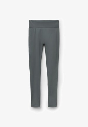 Graue Leggings aus glattem, dehnbarem Stoff mit einem breiten Bund und einem design, das die volle Länge erreicht, ohne sichtbare Nähte oder Muster.