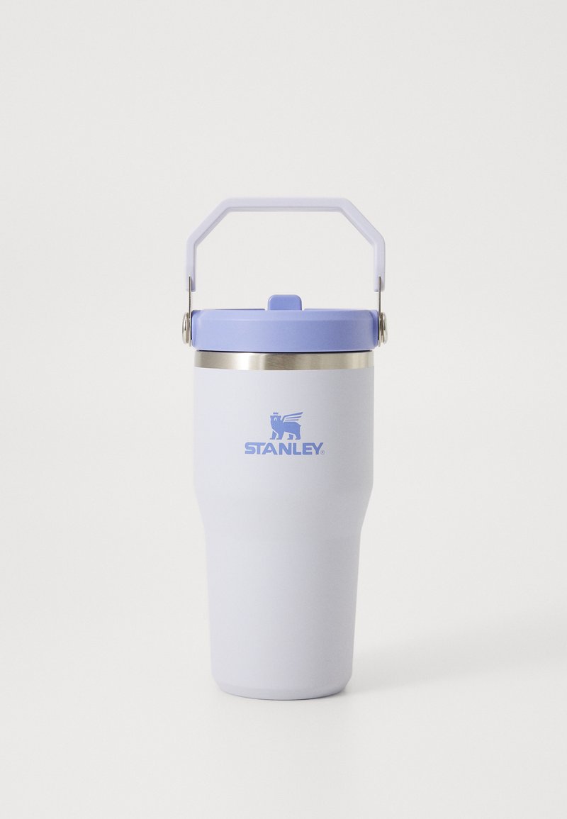 Stainless steel tumbler in white with a lavender lid and handle. Features a silver band at the top, embossed logo, and a smooth texture.