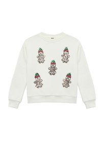 Biała bluza z pięcioma błyszczącymi figurkami piernikowymi w zielonych i czerwonych czapkach, z okrągłymi pomponami oraz miękką, gładką teksturą.