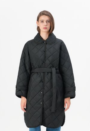 Black quilted coat with a collar, long sleeves, button closure, and a belt. Features diamond patterns and side pockets.